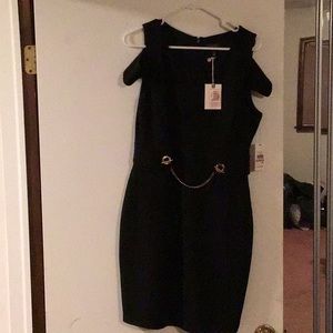 Woman’s cold shoulder dress